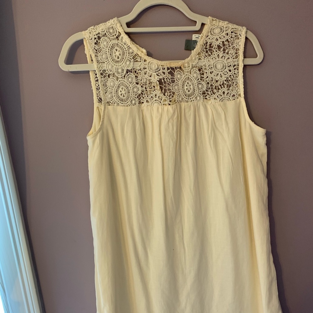 white flowy patterned dress.